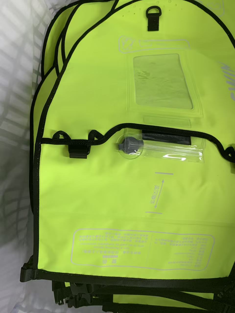 Detail of the clear touch-through window pocket and hardware